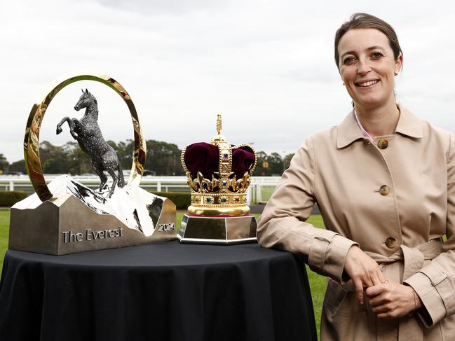 DAILY TELEGRAPH OCTOBER 16, 2024. Warwick Farm trainer Annabel Neasham at Warwick Farm Racecourse with the King Charles III Stakes and The Everest trophies which she has runners in. Picture: Jonathan Ng