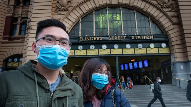 Commuters may soon be asked to wear masks on public transport. Picture: Tony Gough