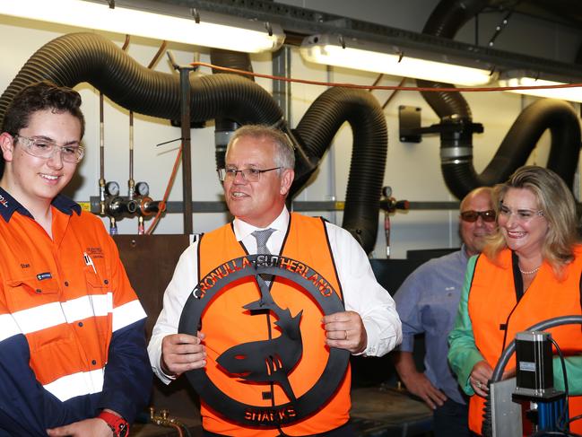 NEWCASTLE, AUSTRALIA - NewsWire Photos - February 8, 2020. Apprentices at HVTC crafted Prime Minister Scott Morrison a Cronulla Sharks trophy out of metal. Prime Minister Scott Morrison visits HVTC Training Company at Rutherford in the Hunter Valley. Picture: NCA NewsWire / Peter Lorimer.