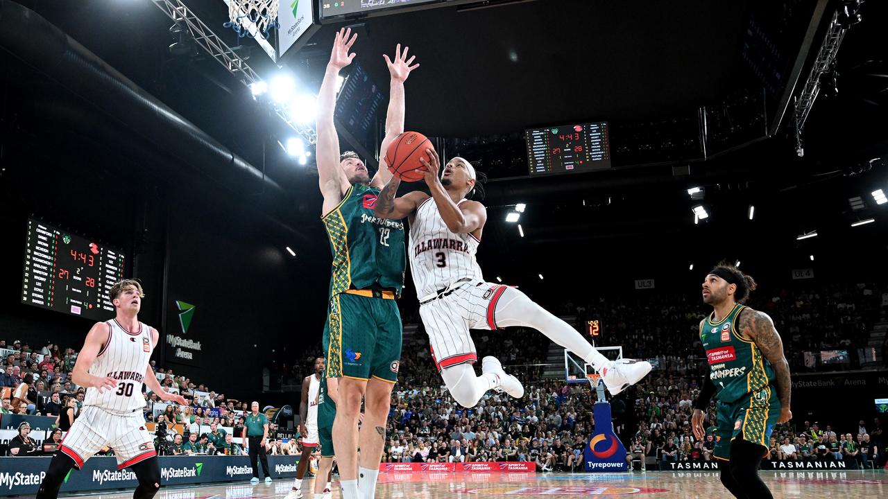 Justin Robinson drives to the basket during his side’s stunning double OT win at MyState Bank Arena in Hobart. Picture: Steve Bell/Getty Images.