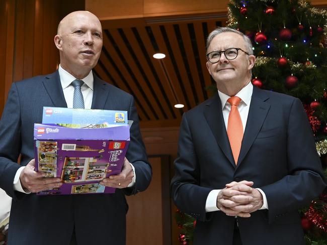 CANBERRA, AUSTRALIA - NOVEMBER 30:  Prime Minister Anthony Albanese and Leader of the Opposition Peter Dutton MP join representatives from Salvation Army and Kmart to drop off Christmas presents at the Kmart wishing tree at  at Parliament House in Canberra. Picture: NCA NewsWire / Martin Ollman