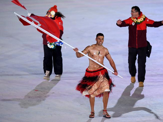 Pita Taufatofua is the ‘flag bearer’ for topless Winter Olympian, ahem, flag bearers. Picture: AAP Image/Dan Himbrechts