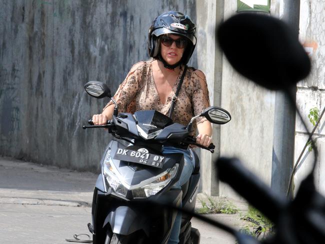 Schapelle Corby's sister Mercedes leaving the lane where they live in Kuta, Bali.