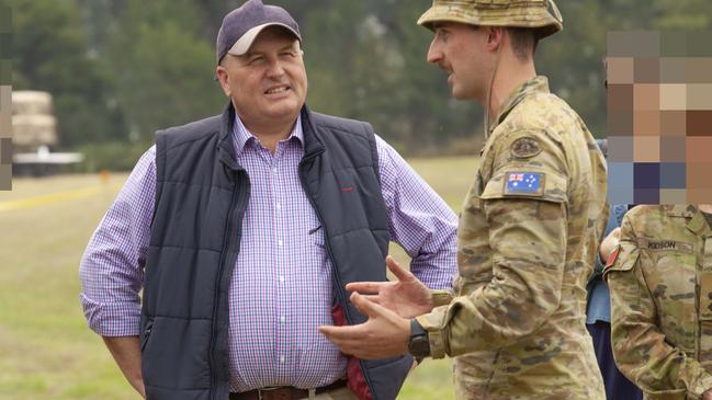 Lieutenant Cody Pratt (right) speaks with Minister David Elliot. Picture: ADF