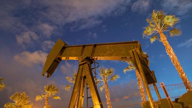 An oil pump jack in California, the US oil price fell to a record low, turning negative, as demand collapsed. Picture: AFP