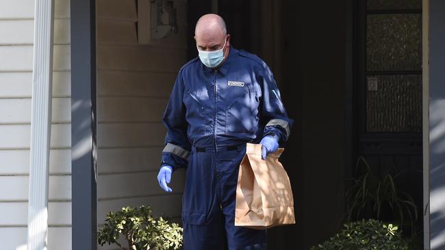 Police at the home on Mary St in Spotswood. Picture: Josie Hayden