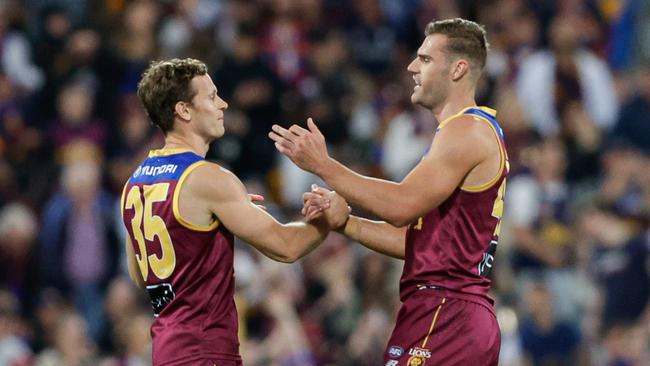 Ryan Lester and Jack Payne after the Lions qualifying final win. Picture: Russell Freeman/AFL Photos