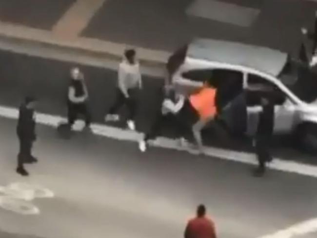 Greater West gang and Inner Western Brotherhood members fight over territory outside Parramatta Westfield. Picture: 7News