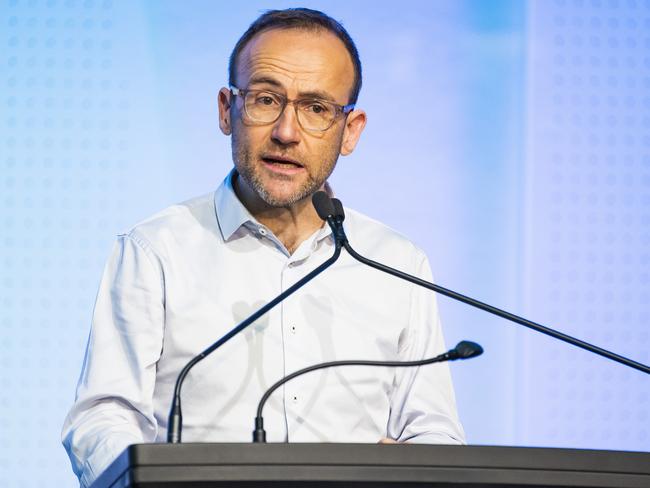 Greens hid the Australian flag from view during Adam Bandt’s first press conference in the Parliamentary Blue Room as a party leaderPicture: Richard Walker