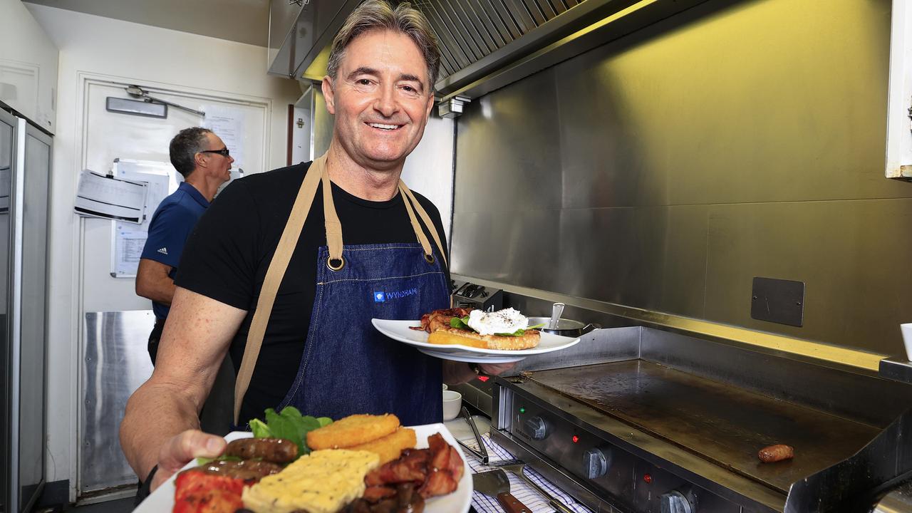 Wyndham Destinations managing director and president Barry Robinson working on the morning breakfast round in the kitchen of Wyndham Resort Surfers Paradise amid staff shortages. Picture: Adam Head