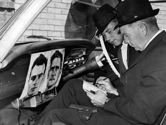 1965: Enlarged pictures of Pentridge escapees Peter Walker and Ronald Ryan are displayed in Victorian police cars for quick identification of the pair after their deadly jailbreak. After they were eventually recaptured in Sydney, Ryan was sentenced to death for the shooting murder of warder George Hodson and was hanged in 1967 — the last person to be executed in Australia. File picture