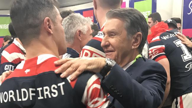 Nick Politis with Cooper Cronk in the Roosters changeroom.