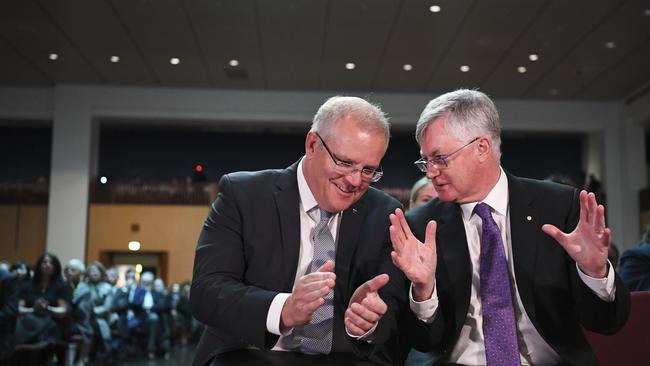 Prime Minister Scott Morrison (left) speaks to Martin Parkinson in Canberra last August. Picture: AAP