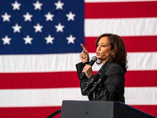 (FILES) US Vice President Kamala Harris speaks during a "Get Out the Vote" rally at the Reggie Lewis Track and Athletic Center at Roxbury Community College in Boston, Massachusetts, on November 2, 2022. Joe Biden on July 21, 2024 dropped out of the US presidential election and endorsed Vice President Kamala Harris as the Democratic Party's new nominee, in a stunning move that upends an already extraordinary 2024 race for the White House. Biden, 81, said he was acting in the "best interest of my party and the country" by bowing to weeks of pressure after a disastrous June debate against Donald Trump stoked worries about his age and mental fitness. (Photo by Joseph Prezioso / AFP)