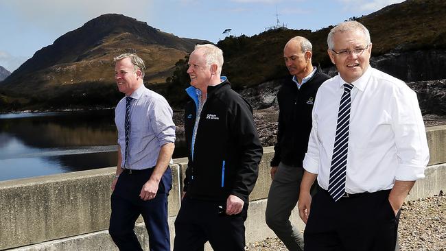 From left, Premier Will Hodgman, Hydro Tasmania CEO Stephen Davy, Energy Minister Guy Barnett and Prime Minister Scott Morrison at Lake Plimsoll on the West Coast. Picture: CHRIS KIDD