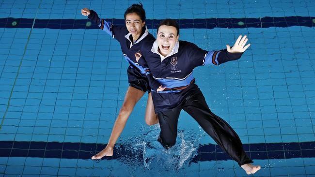 DAILY TELEGRAPH - 7/11/24HSC finishers Mira Karla and Sophia Pavlovic (right) pictured jumping into the school pool at MLC Burwood today after the final exam for the state. Picture: Sam Ruttyn