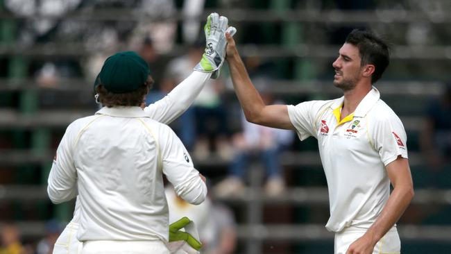 Cummins’ (R) return from injury is one of cricket’s inspiring comeback stories. Picture: AFP