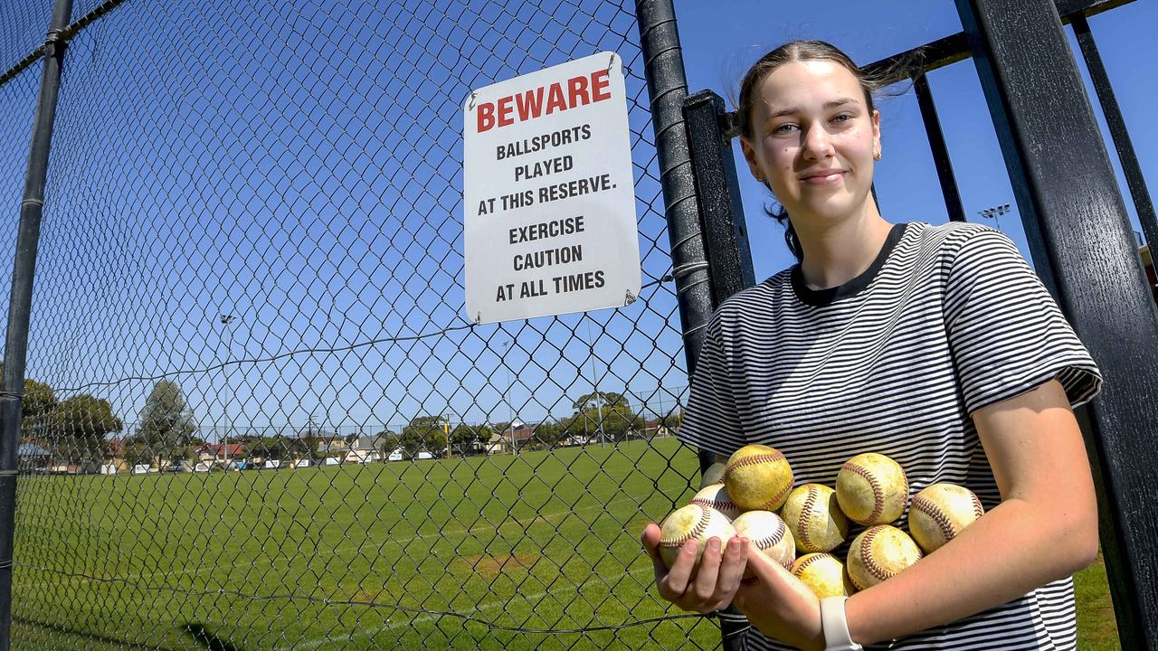 Scarlett Drogemuller and her sister have collected more than a dozen baseballs that have landed on their property. Photo: RoyVPhotography