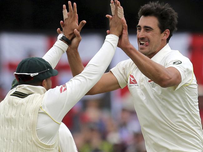 Australia's Mitchell Starc, center, celebrates bowling out England's James Vince, right, during the fourth day of their Ashes cricket test match in Perth, Australia, Sunday, Dec. 17, 2017. (AP Photo/Trevor Collens)