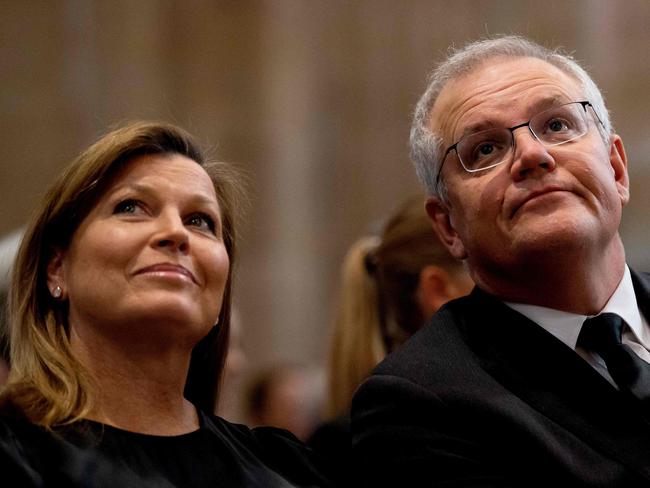 Australia's Prime Minister Scott Morrison (R) and his wife Jenny Morrison attend a special prayer service to commemorate the death of Prince Philip, Duke of Edinburgh, at St Andrew's Cathedral in Sydney on April 11, 2021. (Photo by Bianca DE MARCHI / POOL / AFP)