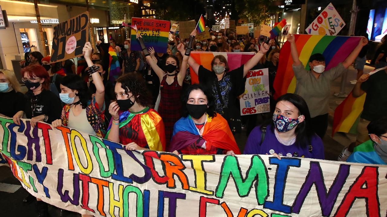 Activists gathered to protest discrimination at the Citipointe Christian College in February after families were asked to sign discriminatory contracts. Picture: Jono Searle/Getty Images.