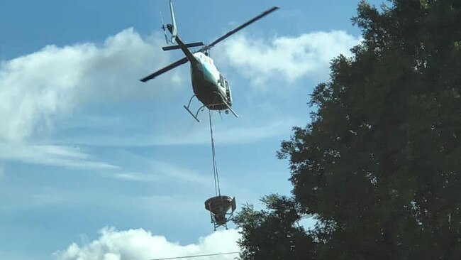 Ian Scott took this photo of the chopper spreading seed.