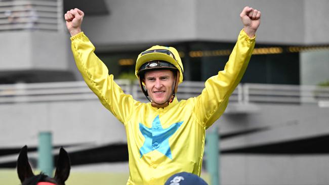 Lucky Sweynesse ridden by Zac Purton celebrates winning the Group 1 Sprint race during the Hong Kong International Races at Sha Tin Racecourse in Hong Kong on December 10, 2023. (Photo by Peter PARKS / AFP)