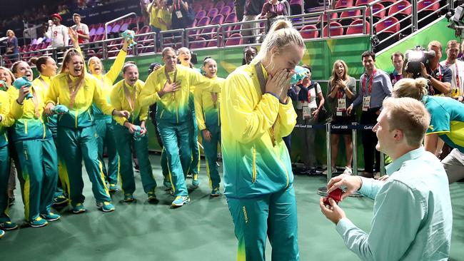 GOLD COAST, AUSTRALIA - APRIL 14:  Nicole Seekamp of Australia is proposed to by her partner following the Women's Gold Medal Game on day 10 of the Gold Coast 2018 Commonwealth Games at Gold Coast Convention Centre on April 14, 2018 on the Gold Coast, Australia.  (Photo by Hannah Peters/Getty Images)