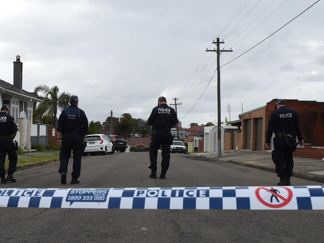 Police at the scene of Pasquale Barbaro’s shooting death on an Earlwood footpath. Picture: Dean Lewins/AAP