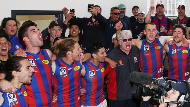 Gary Ayres with Port players after winning its preliminary final. Photo: Michael Dodge/AFL Media/Getty Images)