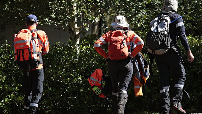 Search and rescue teams assemble to continue the search. Picture: Adam Yip