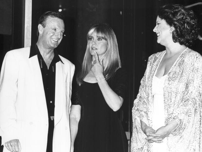 Peter Allen, Olivia Newton-John and Yvonne Kenny at the Entertainment Centre in Sydney for the Newcastle Earthquake Appeal Concert in 1990.