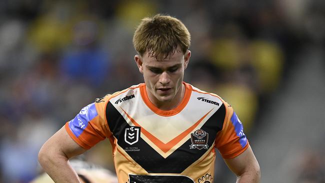 TOWNSVILLE, AUSTRALIA - MAY 24: Lachlan Galvin of the Tigers looks dejected after a Cowboys try during the round 12 NRL match between North Queensland Cowboys and Wests Tigers at Qld Country Bank Stadium, on May 24, 2024, in Townsville, Australia. (Photo by Ian Hitchcock/Getty Images)