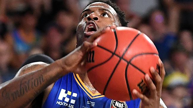 Lamar Patterson on his way to the basket against the Cairns Taipans. Picture: AAP Image/Dan Peled