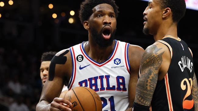 ATLANTA, GA - NOVEMBER 10: Joel Embiid #21 of the Philadelphia 76ers reacts after a foul is called during the second half against the Atlanta Hawks at State Farm Arena on November 10, 2022 in Atlanta, Georgia. NOTE TO USER: User expressly acknowledges and agrees that, by downloading and or using this photograph, User is consenting to the terms and conditions of the Getty Images License Agreement.   Todd Kirkland/Getty Images/AFP