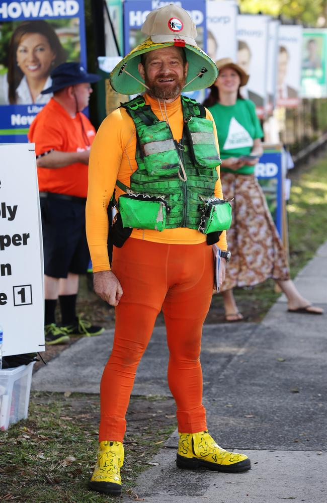 Gwyllam Roberts, 50, dressed in costume and handing out how-to-vote cards for the Shooters and Fishers party outside the Islington Public School polling booth in the seat of Newcastle.