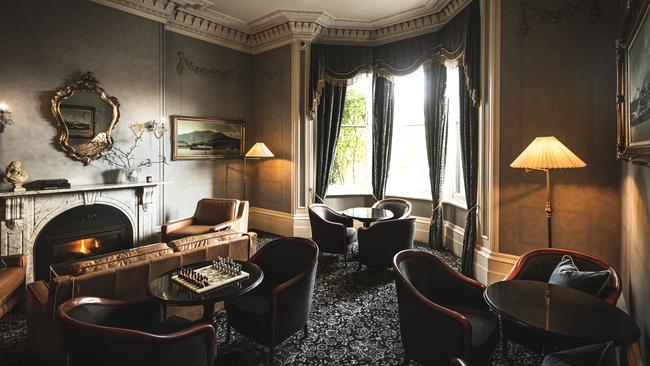 The Lenna of Hobart's elegant Lounge Bar which features a cosy wood fire, antiques and the original gas-lit crystal chandelier was also the setting for some of Tasmania's finest 19th and 20th century social occasions.