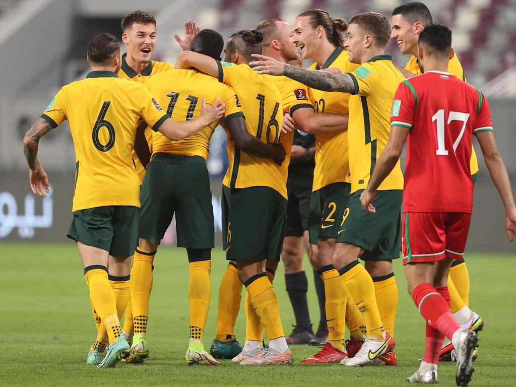 The Socceroos celebrate Awer Mabil’s goal against Oman. Picture: KARIM JAAFAR / AFP