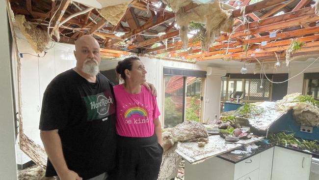 Joyner residents Steve and Jo Warren had a massive gum tree fall on the roof of their home.