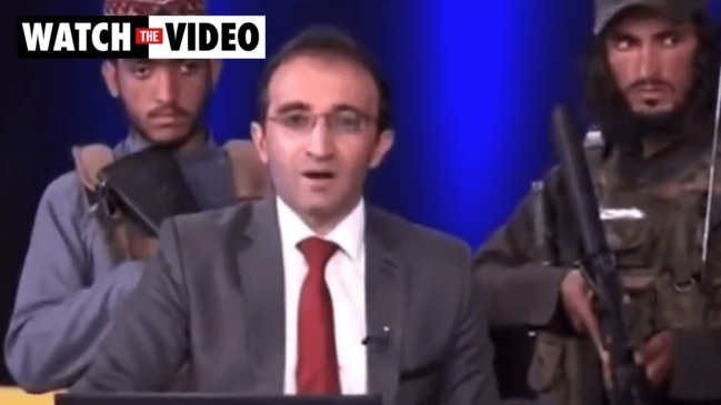 Armed Taliban militants surround TV host during live news show in Afghanistan