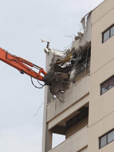 A crane smashes into the old Gold Coast Hospital on December 8, 2014. Picture: Mike Batterham