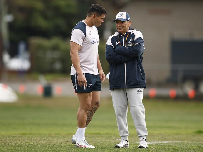 Eddie Jones chats with Izaia Perese during a training session in July. Picture: Photo by Daniel Pockett/Getty Images