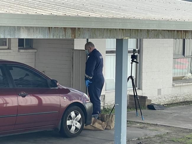 Police have been collecting evidence from the front porch of the home. Picture: Gemma Scerri