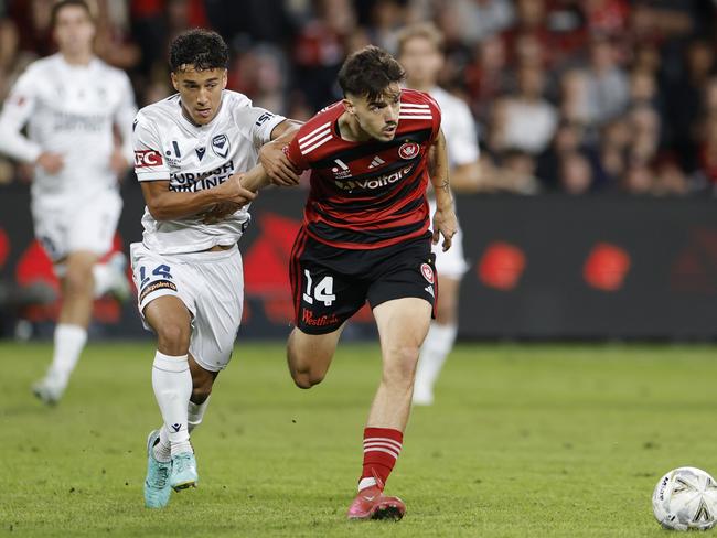 SYDNEY, AUSTRALIA - MAY 10: Jordi Valadon of Melbourne Victory competes with Nicolas Milanovic of the Wanderers during the A-League Men Elimination Final match between Western Sydney Wanderers and Melbourne Victory at CommBank Stadium, on May 10, 2025, in Sydney, Australia. (Photo by Darrian Traynor/Getty Images)