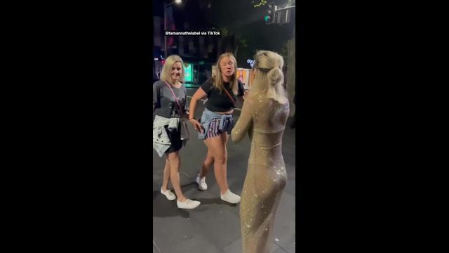 Shock reaction to woman's naked dress