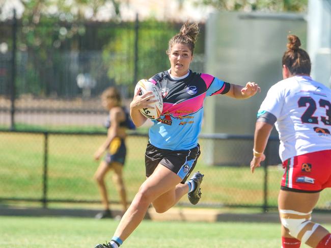 Northern Sharks’ Lauren Linton on the run in her side’s win over Nightcliff. Picture:Glenn Campbell