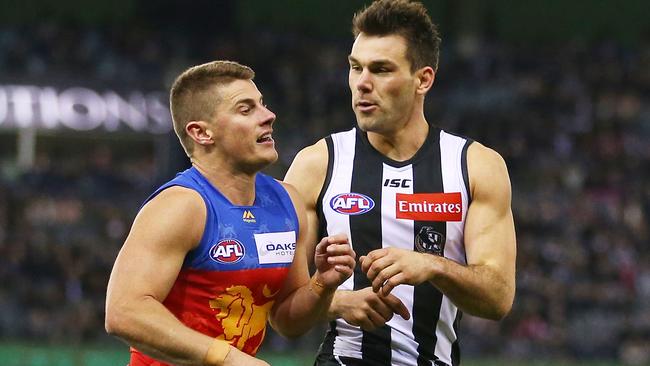 Dayne Zorko clashes with Collingwood tagger Levi Greenwood last season. Picture: Scott Barbour/Getty Images.