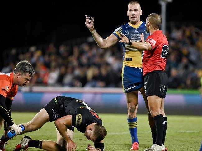 Clint Gutherson remonstrates with referee as Kenny gets up.