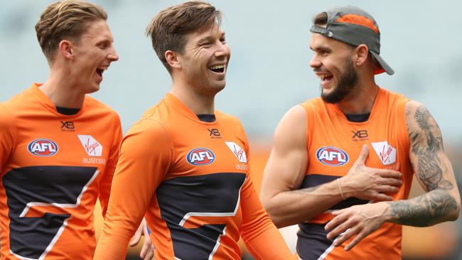 Toby Greene has a laugh with Zac Williams and Lachie Whitfield. Picture: Getty Images