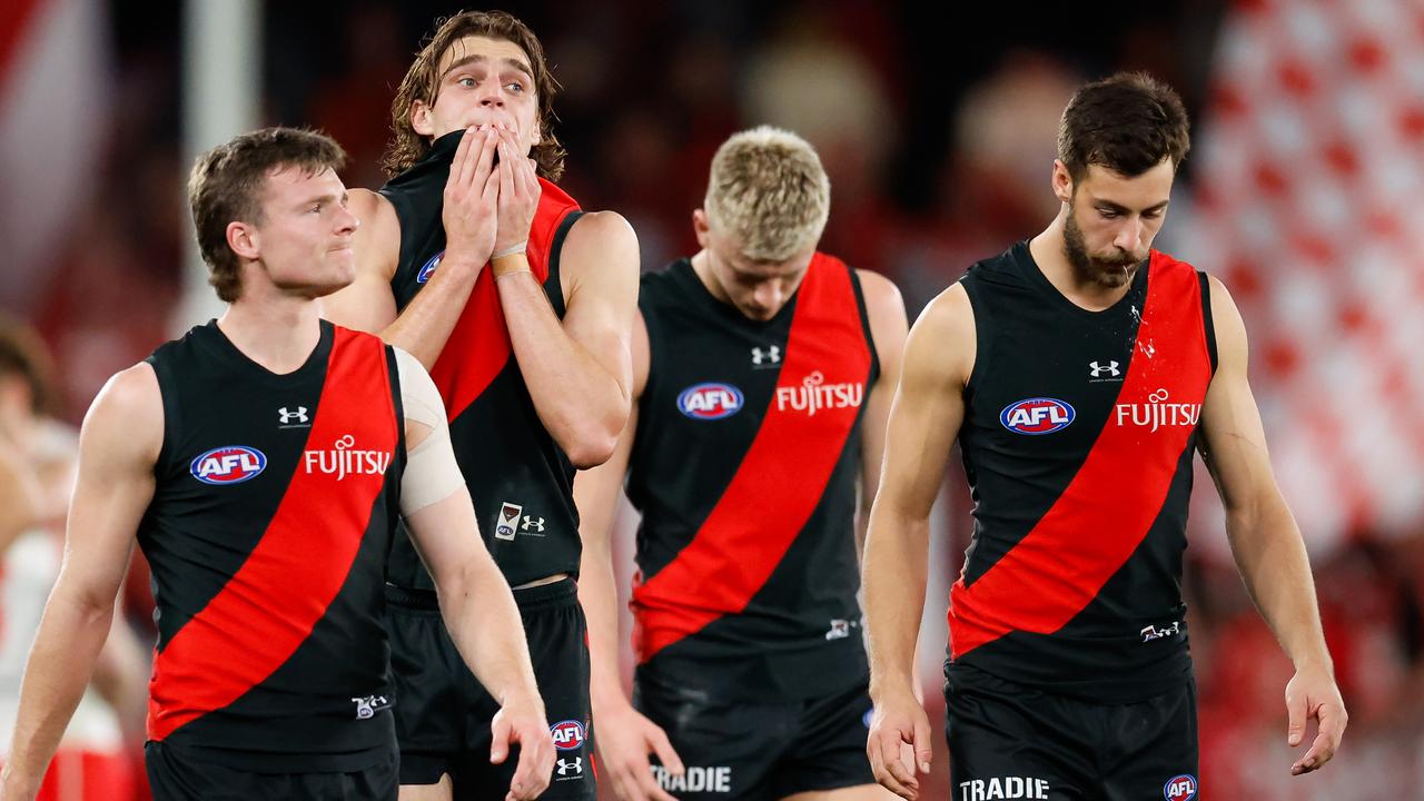 MELBOURNE, AUSTRALIA - AUG 16: Harrison Jones of the Bombers looks dejected after a loss during the 2024 AFL Round 23 match between Essendon Bombers and the Sydney Swans at Marvel Stadium on August 16, 2024 in Melbourne, Australia. (Photo by Dylan Burns/AFL Photos via Getty Images)